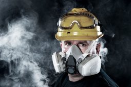 Worker wearing respiratory protection